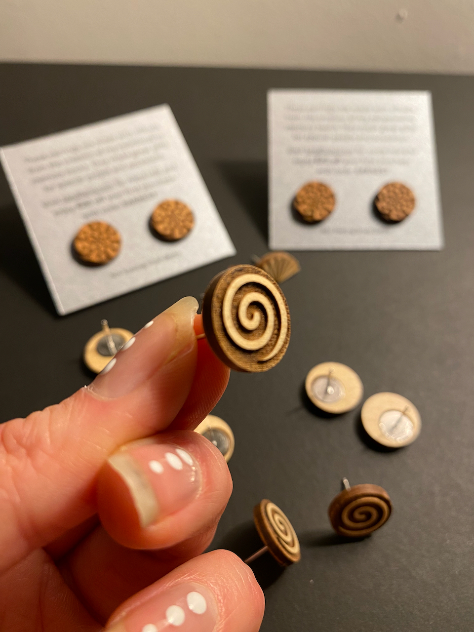 Some earrings I made from the wood offcuts. These are small circular spirals